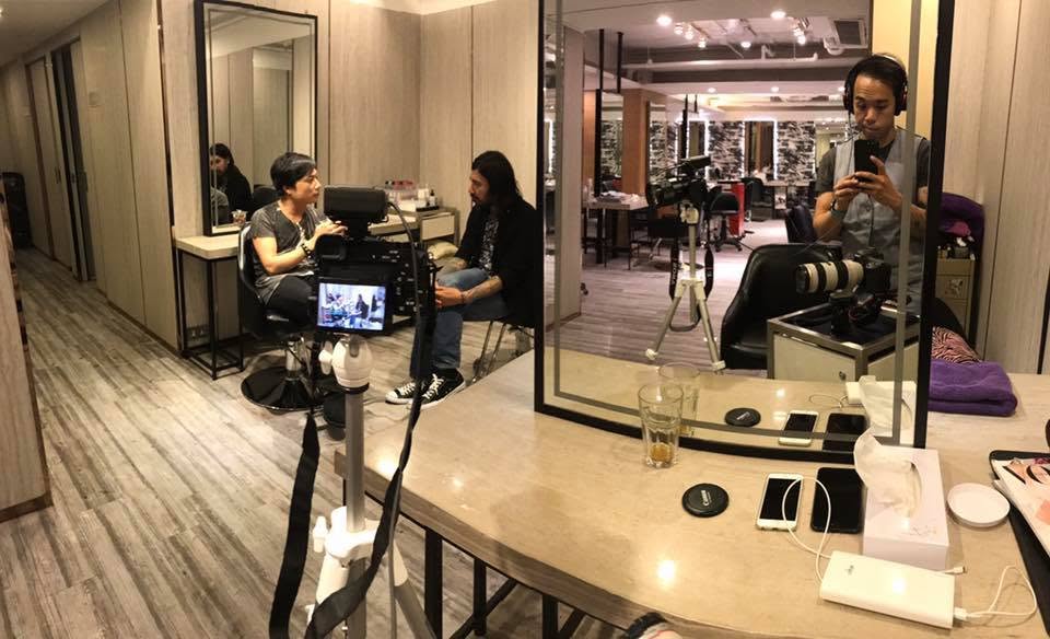 Jenkin Lee working behind the scenes on a documentary recording